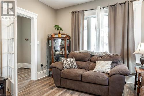 Living room featuring wood-type flooring - 175 Mcnab St, Stratford, ON - Indoor Photo Showing Living Room