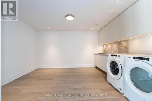 208 - 118 Merchants' Wharf, Toronto, ON - Indoor Photo Showing Laundry Room