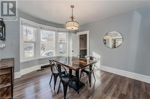 Dining area with dark hardwood / wood-style floors - 20 Sarah Street, Brantford, ON - Indoor Photo Showing Dining Room