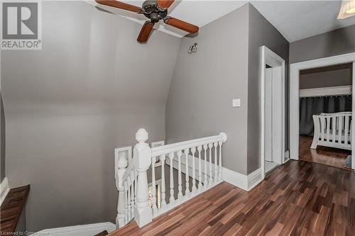 Stairway featuring ceiling fan and hardwood / wood-style flooring - 20 Sarah Street, Brantford, ON - Indoor