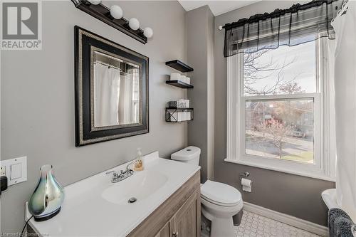 Bathroom with vanity and toilet - 20 Sarah Street, Brantford, ON - Indoor Photo Showing Bathroom