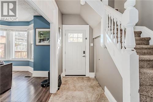 Foyer entrance with light hardwood / wood-style flooring and lofted ceiling - 20 Sarah Street, Brantford, ON - Indoor Photo Showing Other Room