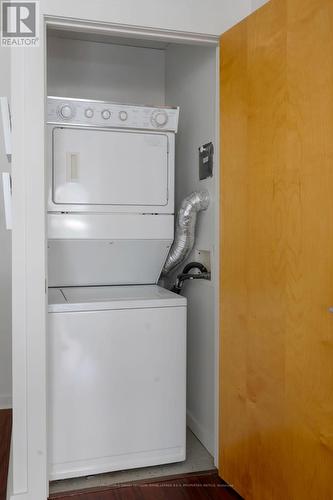 210 - 800 King Street W, Toronto, ON - Indoor Photo Showing Laundry Room