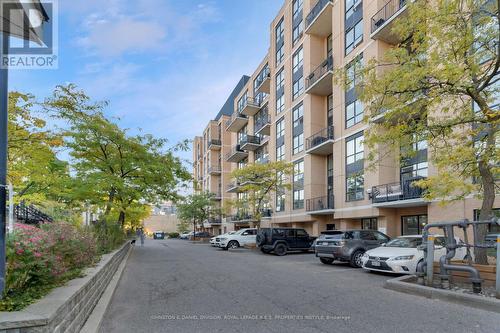 210 - 800 King Street W, Toronto, ON - Outdoor With Balcony With Facade