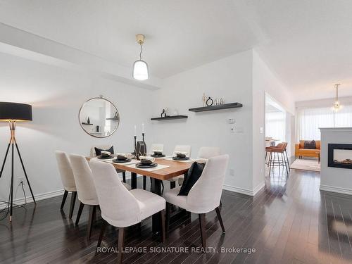 111 Closson Dr, Whitby, ON - Indoor Photo Showing Dining Room With Fireplace