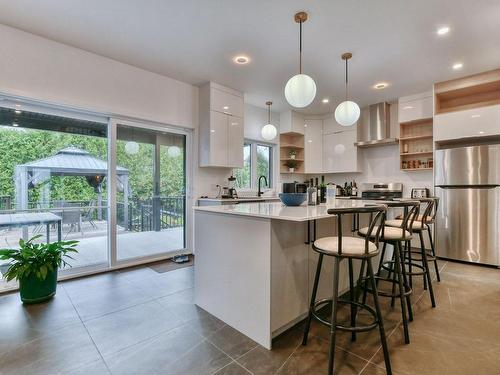 Cuisine - 63 18E Avenue, Sainte-Marthe-Sur-Le-Lac, QC - Indoor Photo Showing Kitchen With Upgraded Kitchen