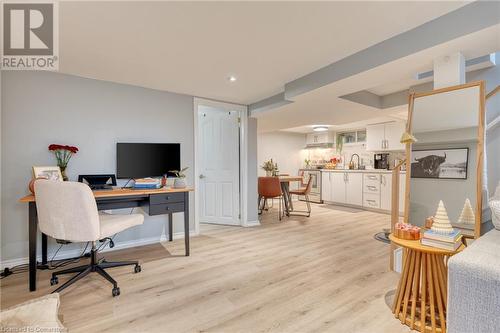 Home office with light wood-type flooring and sink - 99 East 36Th Street, Hamilton, ON - Indoor Photo Showing Office