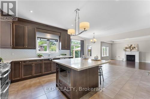 689 Brian Street, Fort Erie (334 - Crescent Park), ON - Indoor Photo Showing Kitchen With Fireplace With Double Sink