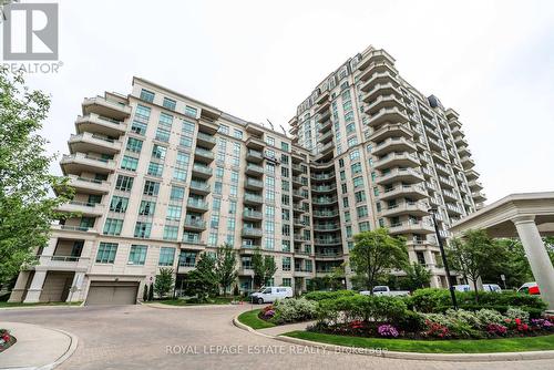 216 - 20 Bloorview Place, Toronto, ON - Outdoor With Balcony With Facade