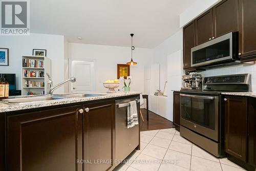 216 - 20 Bloorview Place, Toronto, ON - Indoor Photo Showing Kitchen With Double Sink