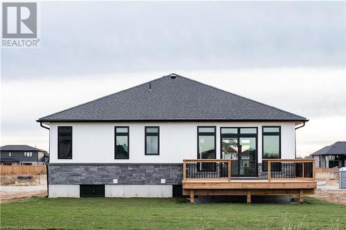 Back of house featuring a deck and a yard - 323 Mclean Crescent, Saugeen Shores, ON - Outdoor With Deck Patio Veranda