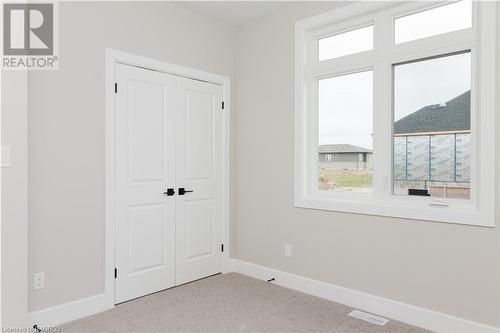 Bedroom with a closet and light coloured carpet - 323 Mclean Crescent, Saugeen Shores, ON - Indoor Photo Showing Other Room