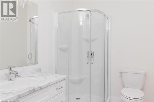 Bathroom featuring vanity, toilet, and a shower with door - 323 Mclean Crescent, Saugeen Shores, ON - Indoor Photo Showing Bathroom