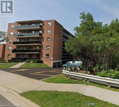 View of building exterior - 2373 King Street E Unit# 48, Hamilton, ON - Outdoor With Balcony With Facade