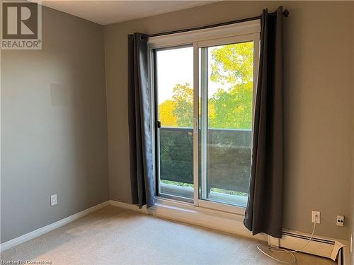 Patio doors to balcony - 2373 King Street E Unit# 48, Hamilton, ON - Indoor Photo Showing Other Room