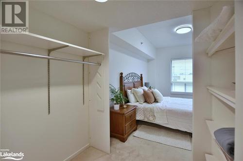 Walk through Closet to Bathroom - 49 Raglan Street Unit# 109, Collingwood, ON - Indoor Photo Showing Bedroom