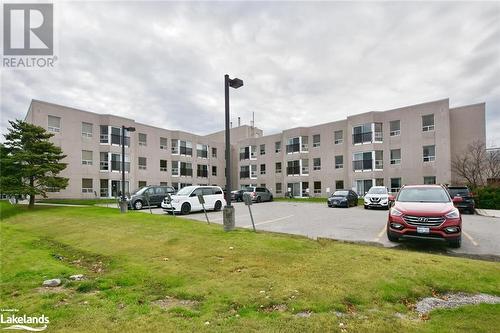 Parking area to walk in patio doors - 49 Raglan Street Unit# 109, Collingwood, ON - Outdoor With Facade