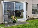 Walk out to yard and parking spot - 49 Raglan Street Unit# 109, Collingwood, ON  -  