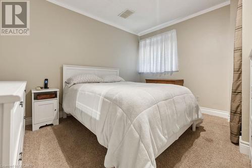 Large Bedroom with Large Above-Grade Windows in Lower Unit - 28 Grove Street, Hamilton, ON - Indoor Photo Showing Bedroom