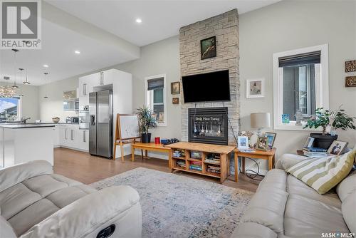 358 Arscott Crescent, Saskatoon, SK - Indoor Photo Showing Living Room With Fireplace