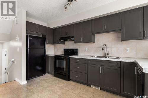 5302 Gordon Road, Regina, SK - Indoor Photo Showing Kitchen With Double Sink