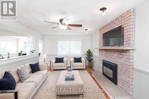 8 Donalda Court, St. Catharines (444 - Carlton/Bunting), ON - Indoor Photo Showing Living Room With Fireplace