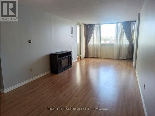 401 - 44 Falby Court, Ajax, ON - Indoor Photo Showing Other Room With Fireplace