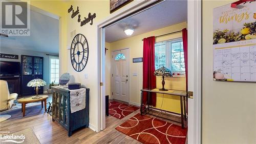 Entryway featuring wood-type flooring - 69 St James Place, Wasaga Beach, ON - Indoor Photo Showing Other Room