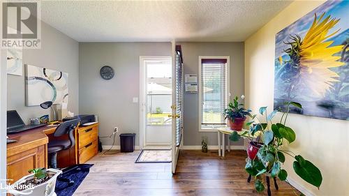 Office featuring a textured ceiling and hardwood / wood-style flooring - 69 St James Place, Wasaga Beach, ON - Indoor