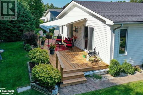 Wooden terrace with a lawn - 69 St James Place, Wasaga Beach, ON - Outdoor With Deck Patio Veranda