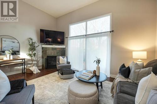 37 - 1975 Rosefield Road, Pickering, ON - Indoor Photo Showing Living Room With Fireplace