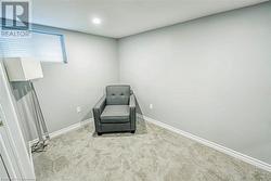 Unfurnished room featuring light carpet - 