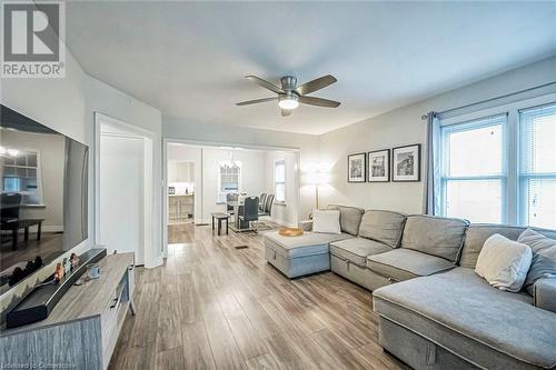 Living room featuring light wood-type flooring and ceiling fan - 72 Elgin Street S, Cambridge, ON - Indoor Photo Showing Living Room