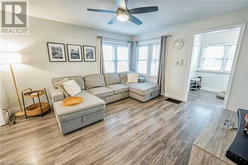 Living room featuring ceiling fan and light hardwood / wood-style floors - 72 Elgin Street S, Cambridge, ON - Indoor Photo Showing Living Room