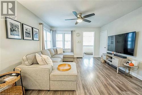 Living room with ceiling fan and hardwood / wood-style floors - 72 Elgin Street S, Cambridge, ON - Indoor Photo Showing Living Room