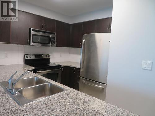 1106 - 4900 Glen Erin Drive, Mississauga, ON - Indoor Photo Showing Kitchen With Double Sink