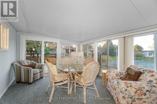 112 Tecumseth Pines Drive, New Tecumseth, ON - Indoor Photo Showing Living Room