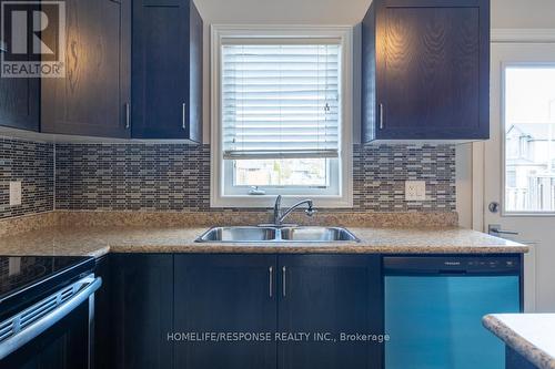 25 - 6117 Kelsey Crescent, Niagara Falls, ON - Indoor Photo Showing Kitchen With Double Sink