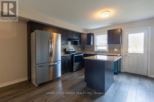 25 - 6117 Kelsey Crescent, Niagara Falls, ON - Indoor Photo Showing Kitchen With Double Sink