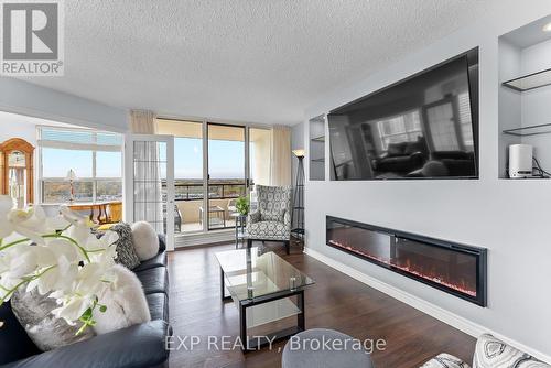 1008 - 3 Towering Hts Boulevard, St. Catharines (461 - Glendale/Glenridge), ON - Indoor Photo Showing Living Room With Fireplace