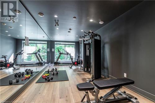 Workout area with light wood-type flooring - 479 Charlton Avenue E Unit# 404, Hamilton, ON - Indoor Photo Showing Gym Room