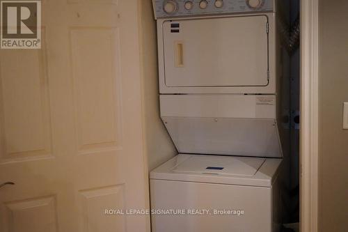 928 - 250 Wellington Street W, Toronto, ON - Indoor Photo Showing Laundry Room