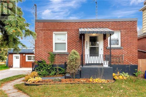 View of front of home featuring a front lawn - 306 Paling Avenue, Hamilton, ON - Outdoor