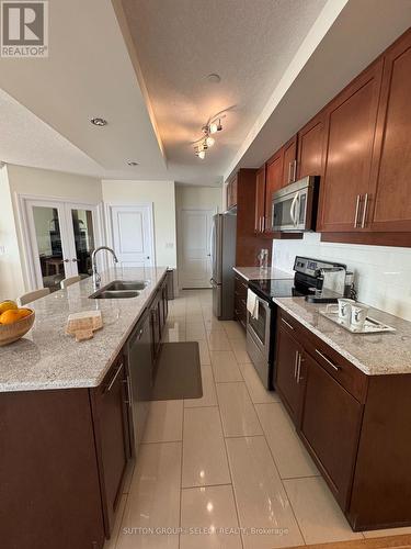 610 - 240 Villagewalk Boulevard, London, ON - Indoor Photo Showing Kitchen With Double Sink