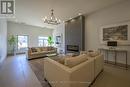 610 - 240 Villagewalk Boulevard, London, ON  - Indoor Photo Showing Living Room With Fireplace 