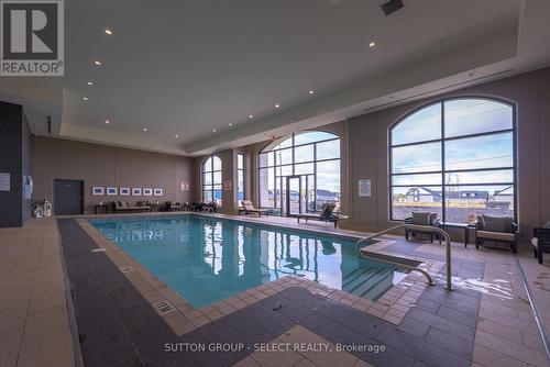 610 - 240 Villagewalk Boulevard, London, ON - Indoor Photo Showing Other Room With In Ground Pool