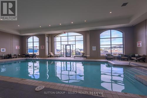 610 - 240 Villagewalk Boulevard, London, ON - Indoor Photo Showing Other Room With In Ground Pool