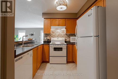 57 - 1853 Blackwater Road, London, ON - Indoor Photo Showing Kitchen With Double Sink