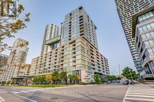 301 - 10 Capreol Court, Toronto, ON - Outdoor With Balcony With Facade