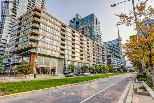 301 - 10 Capreol Court, Toronto, ON - Outdoor With Balcony With Facade